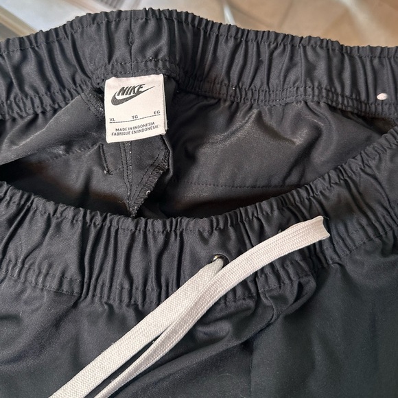 Nike Club Woven Tapered Leg Pants Black-White DX0623-010 - Picture 8 of 14